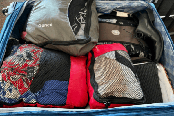 Packing cubes packed in luggage for cruise