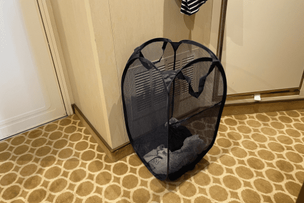 Laundry hamper in cruise cabin