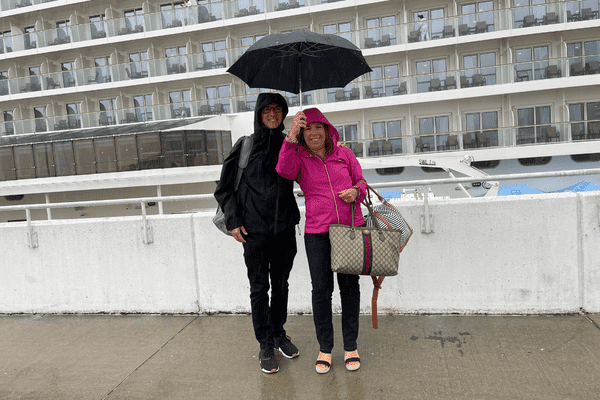 Ilana and Frank wearing rain jackets for cool weather cruise