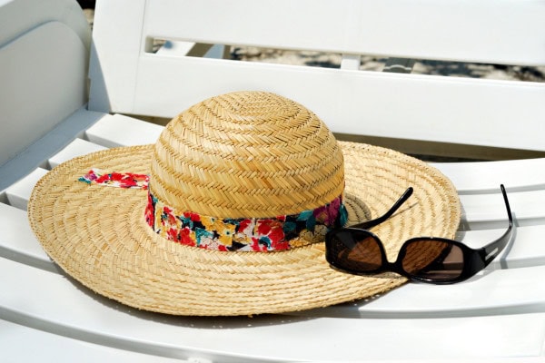 sun hat on lounge chair